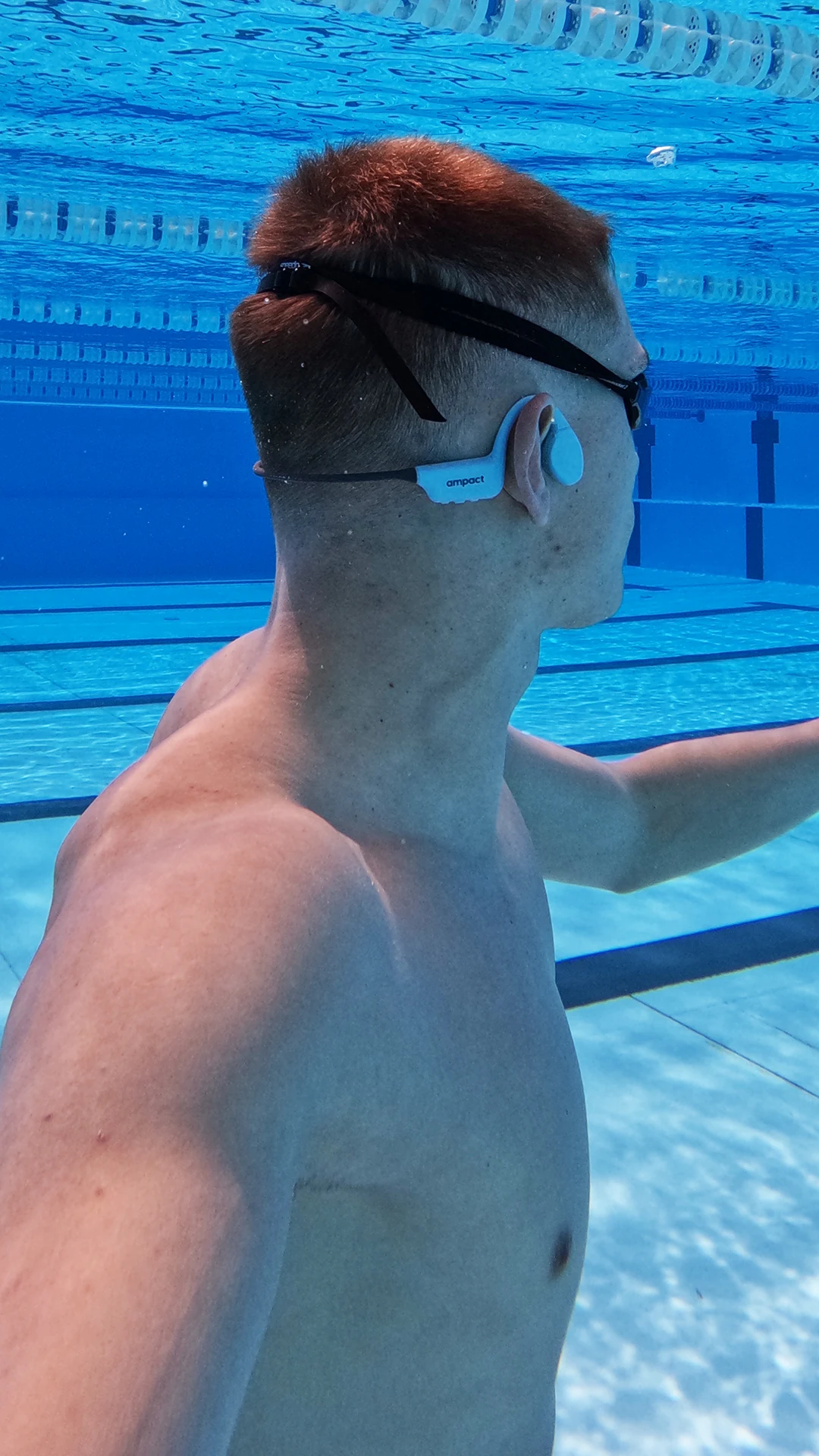 Robert Falborg Pedersen swimming with Ampact